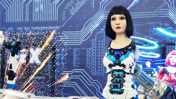 Робот на одном из стендов на Всемирной конференции робототехники (World Robot Conference) в Пекине - Sputnik Таджикистан