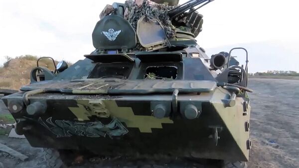 Кадры с захваченной украинской бронетехникой - Sputnik Таджикистан