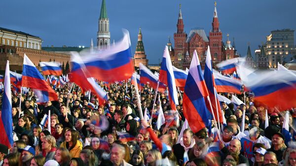 Президент РФ В. Путин принял участие в митинге-концерте на Красной площади - Sputnik Таджикистан