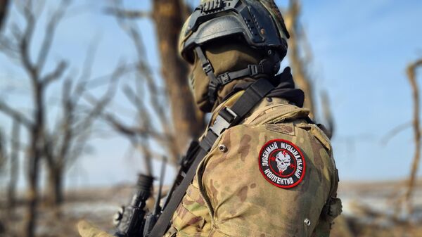 Боец группы Вагнер в Артёмовске (Бахмуте) в ДНР. - Sputnik Таджикистан