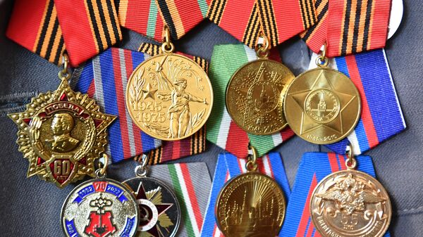 Медали на кителе участника Великой Отечественной войны - Sputnik Таджикистан