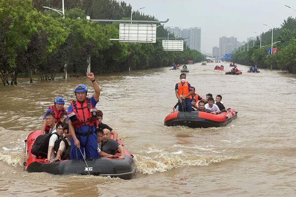 Проливные дожди, которые прошли в Пекине в этом году, стали самыми сильными за последние 140 лет. - Sputnik Таджикистан
