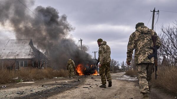 Украинские военнослужащие недалеко от Бахмута, Донецкая область, 23 ноября 2023 года. - Sputnik Таджикистан