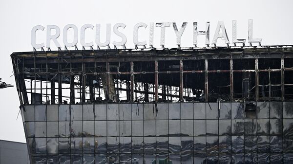 Сгоревшее здание подмосковного Крокус Сити Холла.  - Sputnik Таджикистан