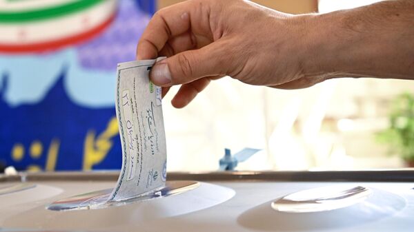 Голосование на президентских выборах в Иране - Sputnik Таджикистан