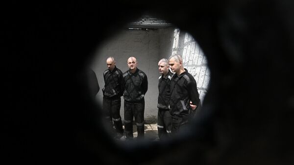 Украинские пленные в российском исправительном учреждении  - Sputnik Тоҷикистон