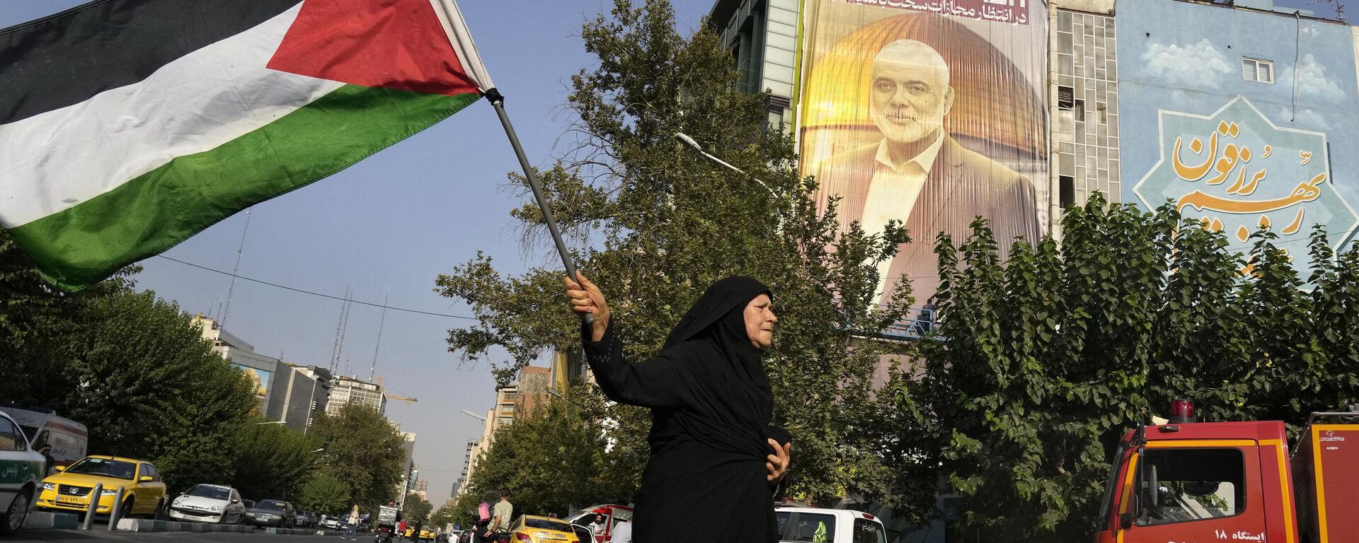 Акция протеста против убийства лидера ХАМАС Исмаила Хании в Тегеране 31 июля 2024 года - Sputnik Тоҷикистон, 1920, 02.08.2024