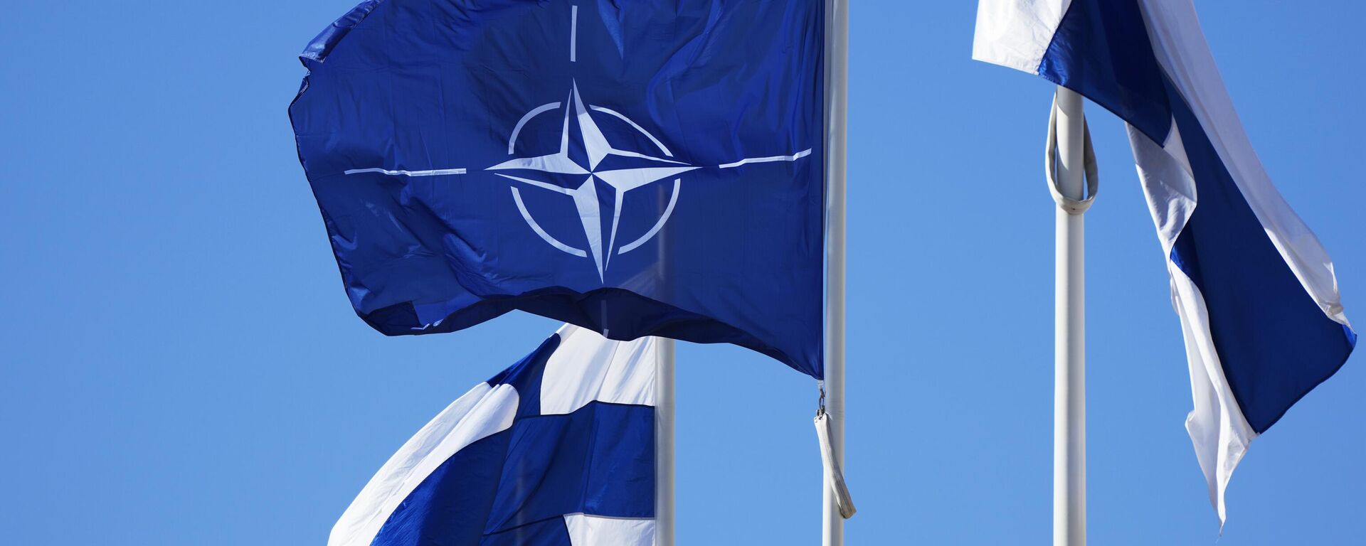 Флаги НАТО и Финляндии - Sputnik Таджикистан, 1920, 11.07.2025