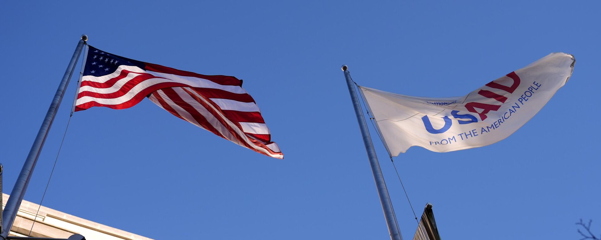 Флаг агентства США по международному развитию (USAID) - Sputnik Тоҷикистон, 1920, 14.02.2025