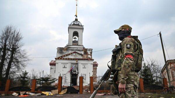 Военнослужащий батальонной тактической группы в Суджанском районе Курской области - Sputnik Тоҷикистон