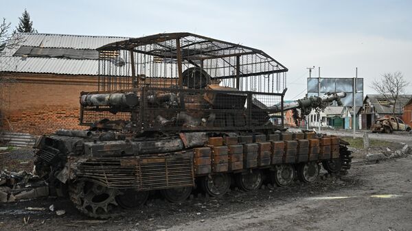 Сгоревшая колонна ВСУ в освобожденном российскими войсками селе Гончаровка в Курской области. - Sputnik Тоҷикистон