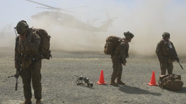 Американские солдаты на авиабазе Паредес в Пасукине во время совместных военных учений на севере Филиппин в понедельник, 6 мая 2024 года - Sputnik Таджикистан