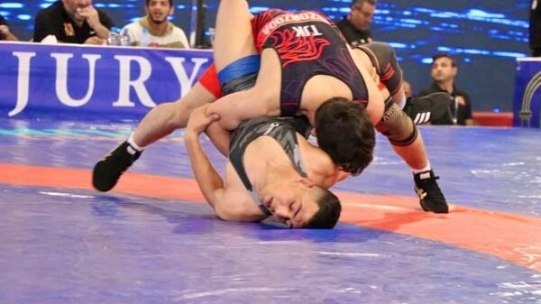 Таджикский спортсмен Аюбджон Бозорзода вышел в четвертьфинал чемпионата мира по вольной борьбе среди юношей до 17 лет, сообщили в мэрии Душанбе - Sputnik Таджикистан