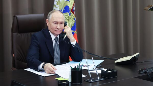 Президент РФ Владимир Путин. Архивное фото - Sputnik Тоҷикистон