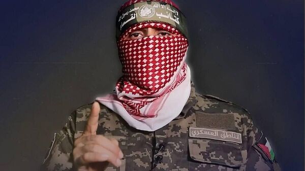 Сухангӯи Ҳамос Абу Убейда дар ҳамлаи Исроил кушта шуд, хабар медиҳад, Al Arabiya - Sputnik Тоҷикистон