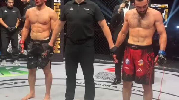 Размикори тоҷик Муҳиддин Холов рақобати навбатияшро дар ACA192 бохт - Sputnik Тоҷикистон