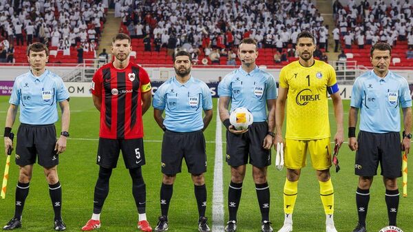 Гурӯҳи доварони элитаи Тоҷикистон таҳти роҳбарии довари ФИФА Гулмуроди Саъдулло бозии даври дуюми марҳилаи гурӯҳии Лигаи қаҳрамонҳои элитаи Осиё-2025/26-ро ҳакамӣ хоҳанд кард - Sputnik Тоҷикистон