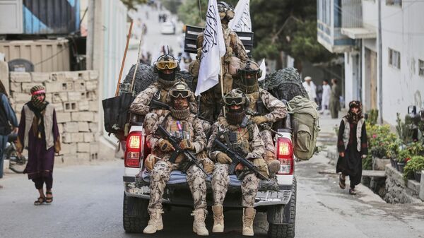 Талибы празднуют четвертую годовщину вывода войск США. Архивное фото - Sputnik Тоҷикистон