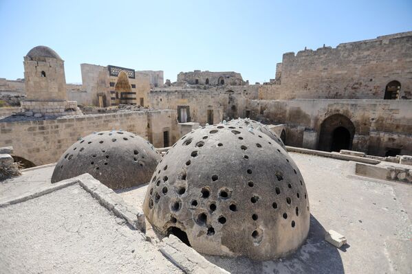 В городе начались работы по восстановлению исторического наследия, включая цитадель, после того, как завершились боевые действия. - Sputnik Таджикистан