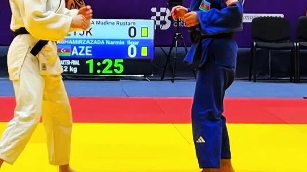 Мадина Қурбонзода дар даври чаҳорякниҳоии Бозиҳои ИДМ-2025 аз ҷудокори озарбойҷонӣ Оғомирзозода Нармин шикаст хӯрд - Sputnik Тоҷикистон