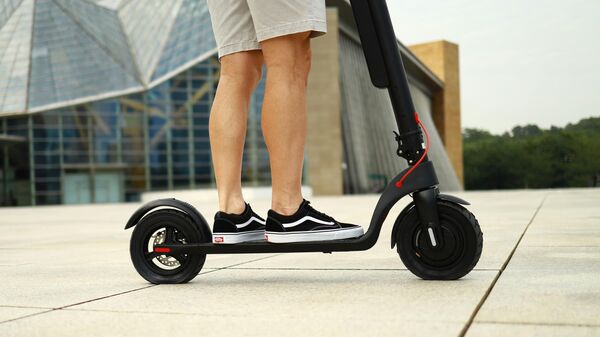 Электросамокат. Иллюстративное фото  - Sputnik Тоҷикистон