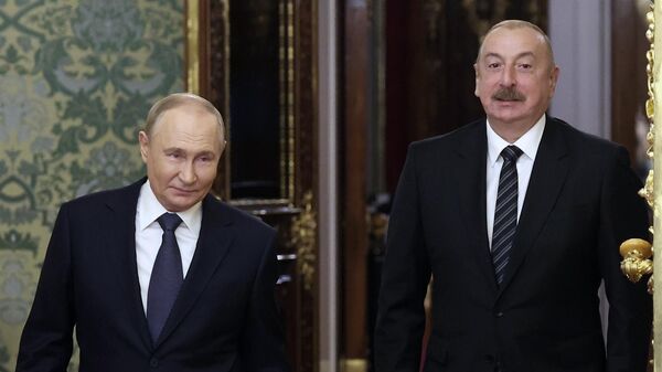 Президент РФ Владимир Путин и президент Азербайджана Ильхам Алиев. Архивное фото - Sputnik Таджикистан