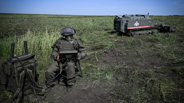 Разминирование сельхозугодий в Курской области  - Sputnik Тоҷикистон