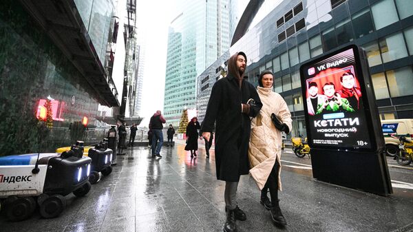 Пешеходы у международного делового центра Москва-Сити (ММДЦ Москва-Сити). - Sputnik Тоҷикистон