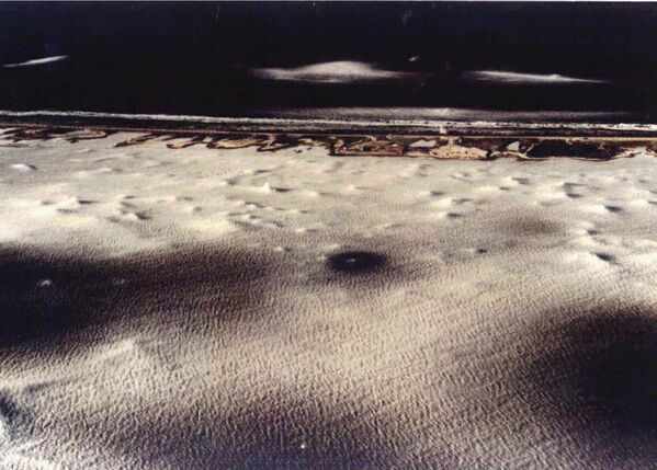 Лагуна Муруроа в Французской Полинезии после подземного ядерного испытания, проведенного Францией 5 сентября 1995 года. - Sputnik Таджикистан