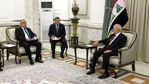 Встреча президента Ирака Абдула Латифа Рашида и советника по национальной безопасности Таджикистана Юсуфа Рахмона Ахмадзода - Sputnik Тоҷикистон