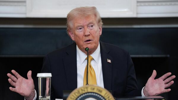 Президент США Дональд Трамп. Архивное фото - Sputnik Тоҷикистон