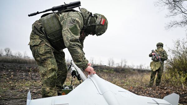 Боевая работа расчета БПЛА на Купянском участке фронта - Sputnik Таджикистан
