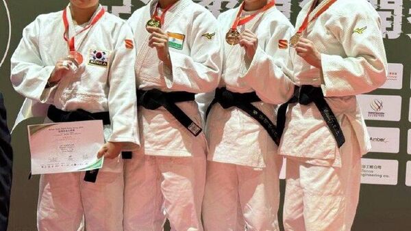 Ҷудокорбонуи тоҷик Александра Кан дар Ҷоми кушоди Осиё оид ба ҷудо медали биринҷӣ гирифт - Sputnik Тоҷикистон