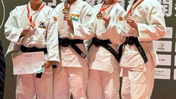 Спортсменка из Таджикистана Александра Кан завоевала бронзовую медаль на Открытом чемпионате Азии по дзюдо в Гонконге - Sputnik Таджикистан