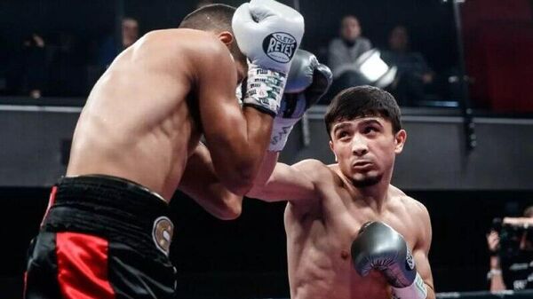 Мухаммад Якубов провел вничью бой за пояс WBC Super Feather - Sputnik Таджикистан