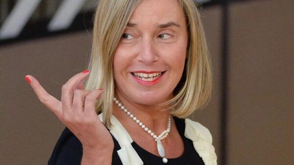 Собиқ роҳбари дипломатияи Аврупо Могерини (2014-2019) бо иттиҳоми қаллобӣ боздошт шудааст, - AFP - Sputnik Тоҷикистон