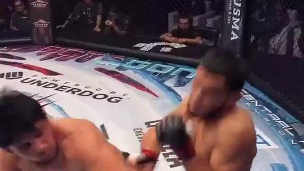 Дилшод Норкузиев победил на OCTAGON 83 - Sputnik Таджикистан