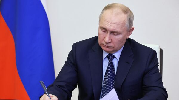 Президент РФ Владимир Путин. Архивное фото - Sputnik Таджикистан