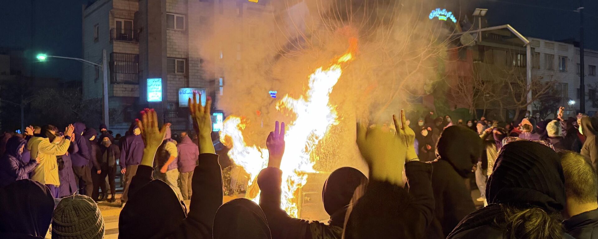 Антиправительственная акция протеста в Тегеране, Иран, в пятницу, 9 января 2026 года. - Sputnik Таджикистан, 1920, 22.01.2026