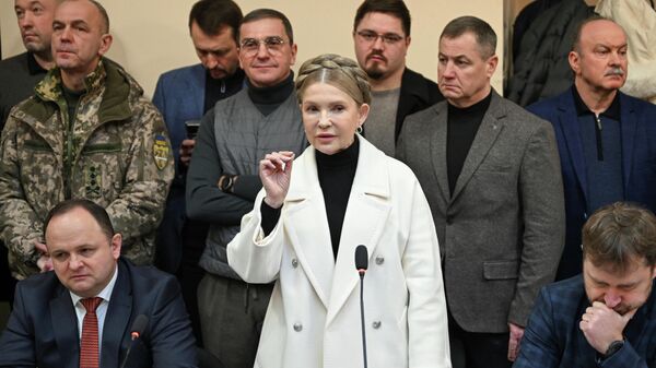 Украинский депутат и лидер партии Батькивщина Юлия Тимошенко присутствует на судебном заседании в Киеве 16 января 2026 года.  - Sputnik Тоҷикистон