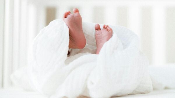 Новорожденный. Иллюстративное фото - Sputnik Тоҷикистон