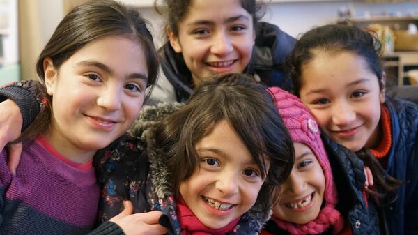Дети беженцев из Сирии и Афганистана. Иллюстративное фото - Sputnik Таджикистан