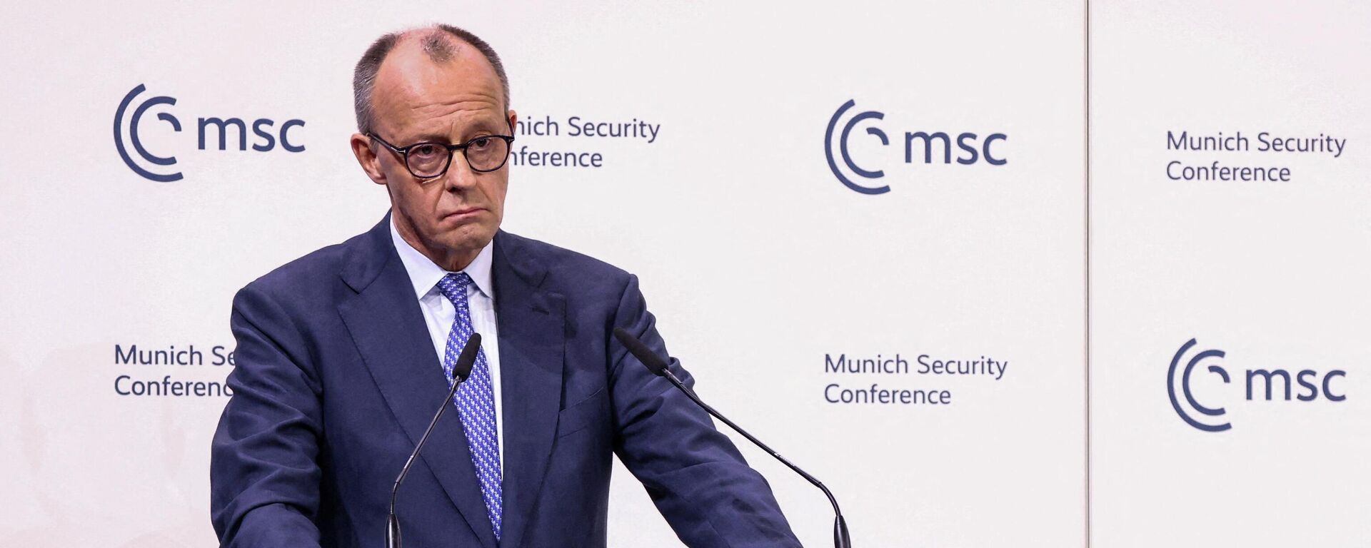 Канцлер Германии Фридрих Мерц выступает на Мюнхенской конференции по безопасности в Мюнхене, Германия, 13 февраля 2026 года. - Sputnik Тоҷикистон, 1920, 21.02.2026