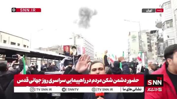 Ҳамлаҳои ИМА ва Исроил ба маҳаллаҳои Теҳрон, ҳангоми раҳпаймоии оммавӣ - Sputnik Тоҷикистон