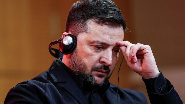 Владимир Зеленский во время дискуссии в парижском университете Sciences Po, 13 марта 2026 года. - Sputnik Таджикистан