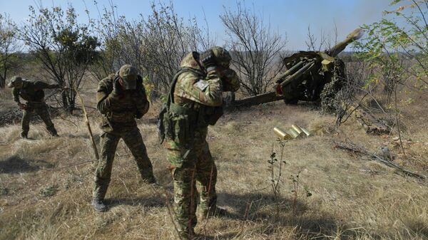 Боевая работа артиллеристов на Ореховском направлении.  - Sputnik Тоҷикистон