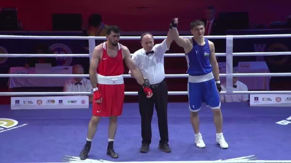 Таджикский боксер Парвиз Каримов завоевал серебро чемпионата Азии - Sputnik Таджикистан