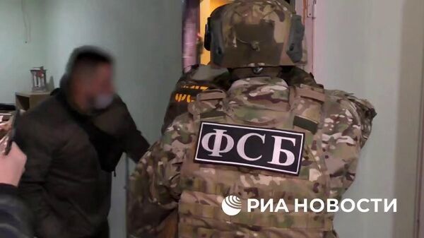 Кадры задержания готовивших теракт против руководства Роскомнадзора  - Sputnik Таджикистан