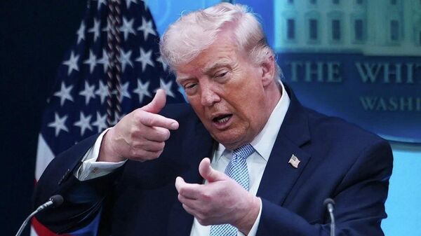 Олмон бовар дорад, ки сиёсати таҳдидноки хоми Трамп ба поён расидааст, менависад Политико - Sputnik Тоҷикистон