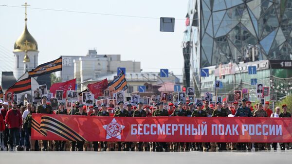 Акция Бессмертный полк в Новосибирске - Sputnik Тоҷикистон